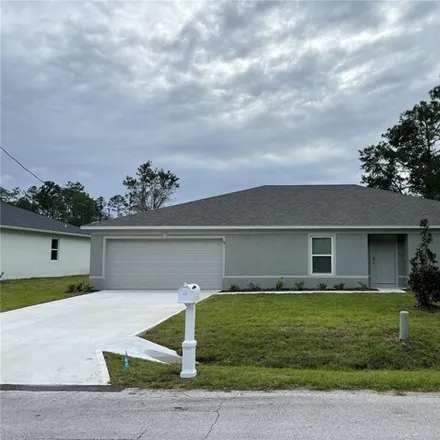 Rent this 4 bed house on 52 Rambling Lane in Palm Coast, FL 32164