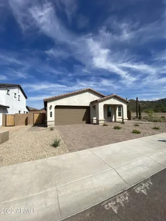 Rent this 4 bed house on 8769 West Maya Way in Peoria, AZ 85383