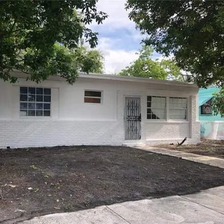 Rent this 4 bed house on 166 Northwest 68th Terrace in Edison Center, Miami