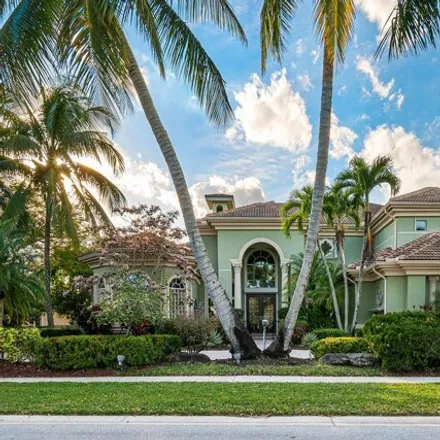 Buy this 5 bed house on 6665 Audubon Trace West in West Palm Beach, FL 33412
