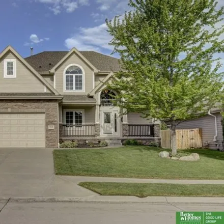 Buy this 4 bed house on 12150 South 49th Street in Bellevue, NE 68133