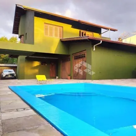 Buy this 3 bed house on Rua Paulino Frizzo in Desvio Rizzo, Caxias do Sul - RS