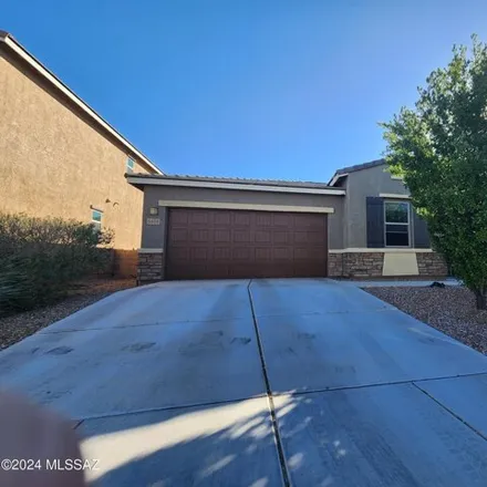 Buy this 4 bed house on 6654 East Via Boca Chica in Tucson, AZ 85756