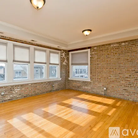 Rent this 2 bed condo on 3040 W Diversey Ave