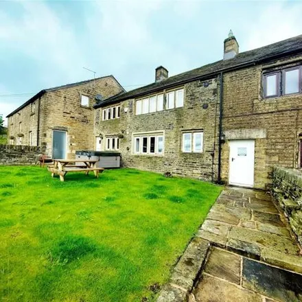 Rent this 4 bed townhouse on Oldham Road in Dobcross, OL3 5GL