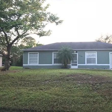 Buy this 3 bed house on 1149 Southwest Dorchester Street in Port Saint Lucie, FL 34983