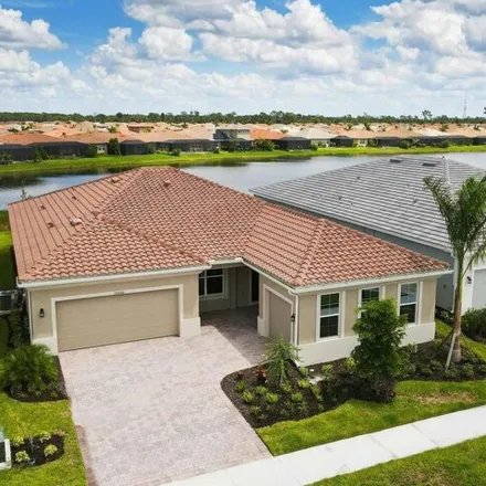 Buy this 3 bed house on Symphony Place in North Port, FL