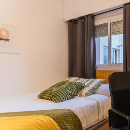 Rent this 5 bed room on Carrer del Doctor Gómez Ferrer in 19, 46010 Valencia