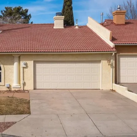 Buy this 3 bed townhouse on 10543 Malaguena Lane Northeast in Academy Ridge East, Albuquerque