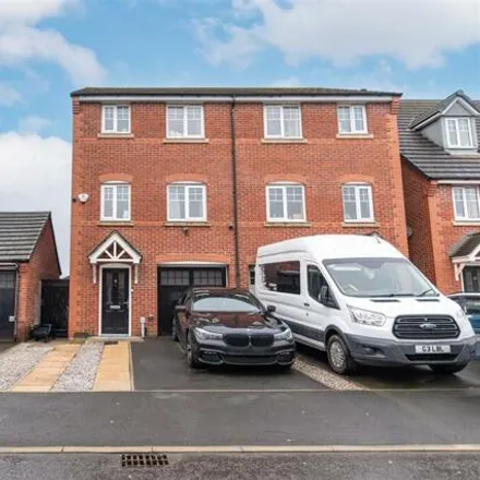 Buy this 4 bed townhouse on Harefield Hall Farm in Gort Way, Heywood