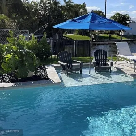 Rent this 4 bed house on 6239 Northeast 19th Terrace in Imperial Point, Fort Lauderdale