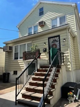 Buy this 4 bed townhouse on 1650 85th Street in New York, NY 11214