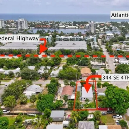 Buy this 4 bed house on 386 Southeast 4th Avenue in Delray Beach, FL 33483
