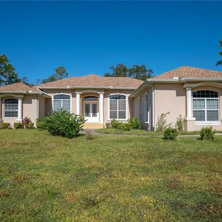 Buy this 4 bed house on 1625 Itchepackesassa Drive in Polk County, FL 33810
