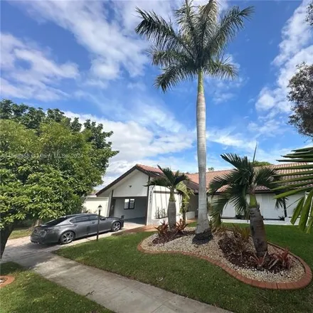Rent this 4 bed house on 3661 Farragut Street in Hollywood, FL 33021