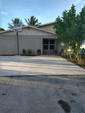 Buy this 3 bed townhouse on 5802 South Rue Road in Palm Beach County, FL 33415