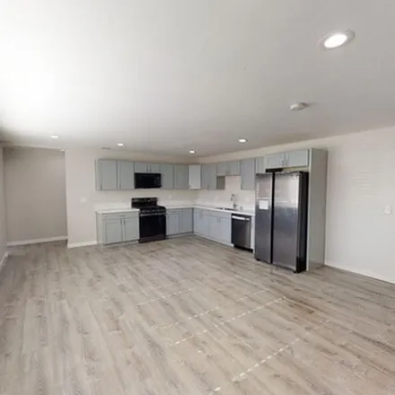 Rent this 4 bed apartment on 6263 Stewart Street in San Diego, CA 92115