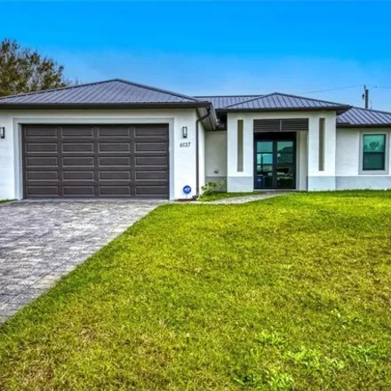 Buy this 4 bed house on 6179 Holt Court in River Hall, Lehigh Acres