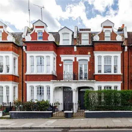 Buy this 4 bed townhouse on Apple Nails Spa in 26 Parsons Green Lane, London