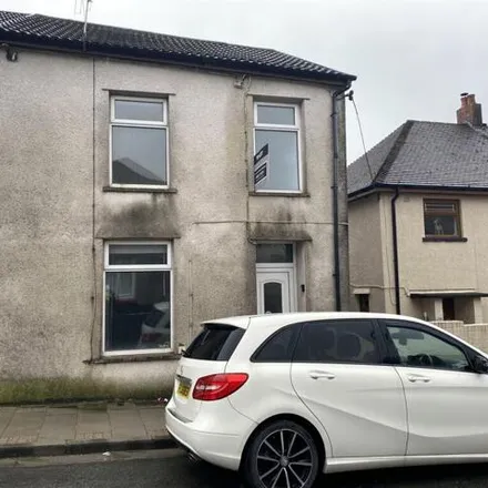 Rent this 3 bed townhouse on Olive Terrace in Trebanog, CF39 9YU