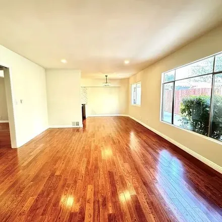 Rent this 3 bed apartment on 1325 South Ridgeley Drive in Los Angeles, CA 90019