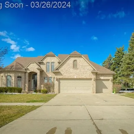 Buy this 4 bed house on 21783 Summerfield Drive in Macomb Township, MI 48044