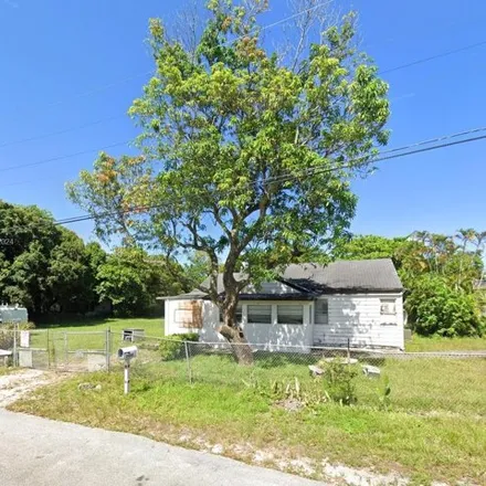 Buy this 2 bed house on 2638 Northwest 19th Avenue in Middle River, Broward County