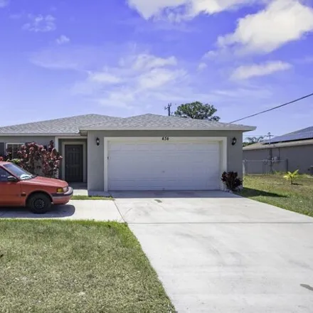 Buy this 4 bed house on 409 Northeast Airoso Boulevard in Port Saint Lucie, FL 34983