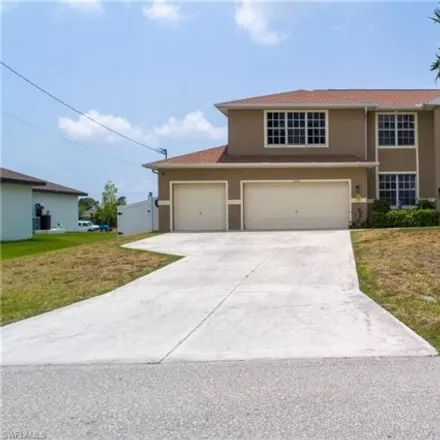 Buy this 4 bed house on 3224 Nw 1st Ave in Cape Coral, Florida