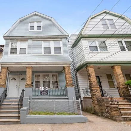 Rent this 3 bed house on 37 Dwight Street in Jersey City, NJ 07305