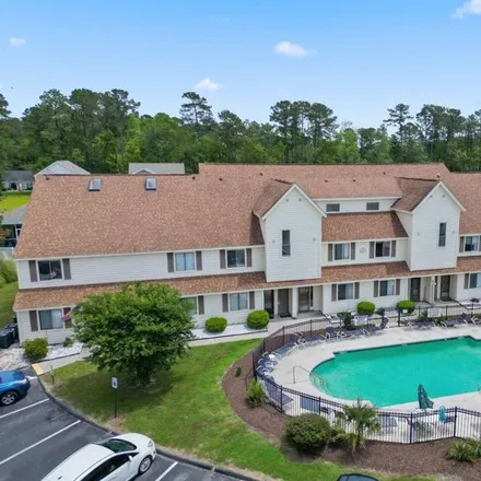 Buy this 2 bed condo on Fairwood Lakes Lane in Island Green, Horry County