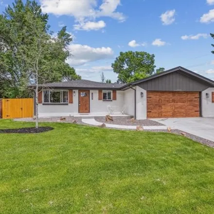Buy this 4 bed house on 12089 W 66th Pl in Arvada, Colorado