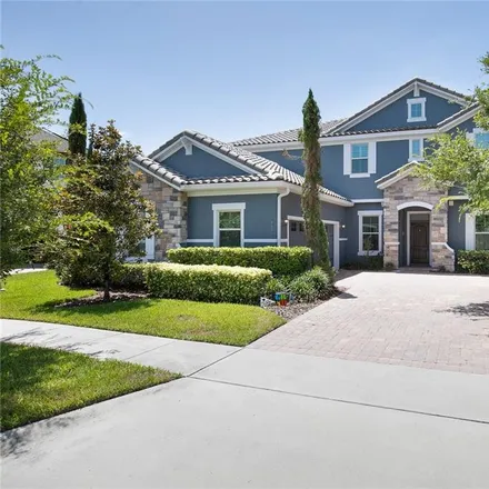 Buy this 5 bed house on Hamlin Groves Trail in Horizon West Town Center, FL 23786