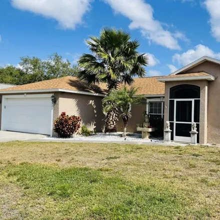 Buy this 3 bed house on 1621 Alpha Street Northeast in Palm Bay, FL 32907