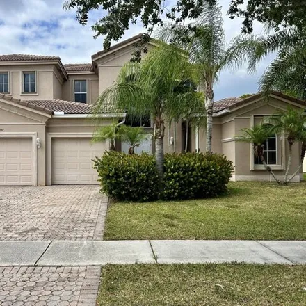 Rent this 5 bed house on 9245 Pineville Drive in Palm Beach County, FL 33467