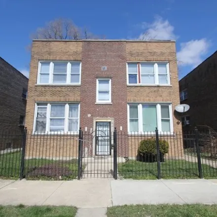 Buy this 8 bed house on 5034-5036 West Congress Parkway in Chicago, IL 60644