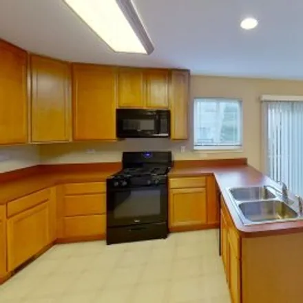 Rent this 3 bed apartment on 895 Clover Lane in Cambridge Lakes, Pingree Grove