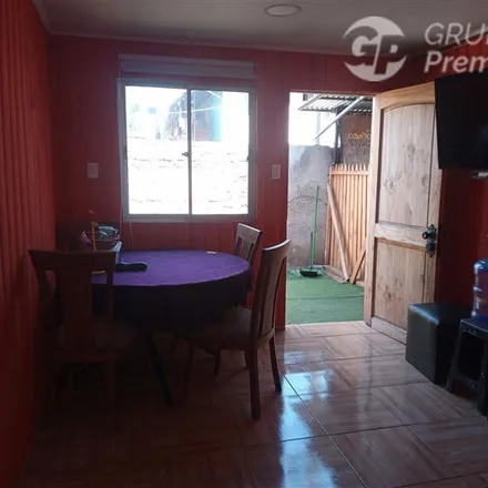 Buy this 4 bed house on Voltaire Carvajal 5318 in 919 0847 Provincia de Santiago, Chile