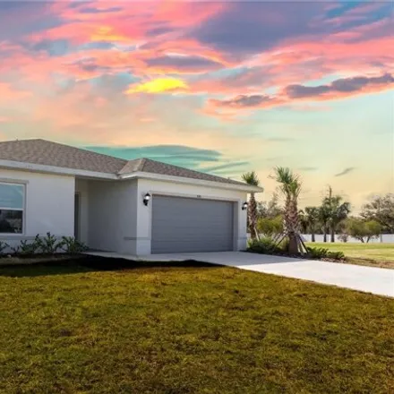 Buy this 3 bed house on 542 Rose Apple Circle in Charlotte County, FL 33954