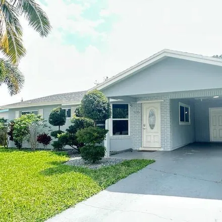 Rent this 3 bed house on 426 SW 8th Ave