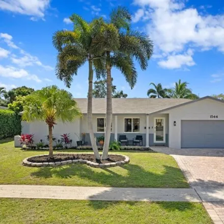 Buy this 4 bed house on 1564 Southwest 13th Drive in Boca Raton, FL 33486