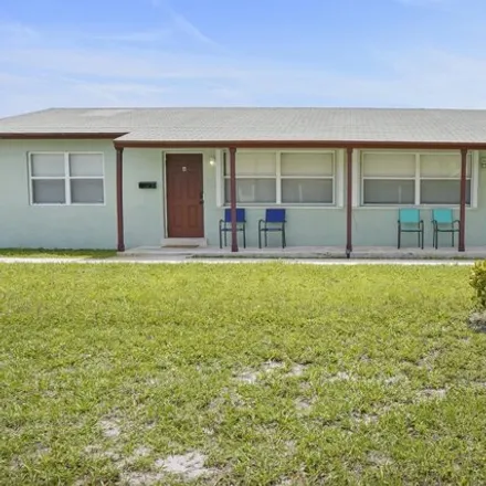 Image 1 - 466 Silver Beach Road, Riviera Beach, FL 33403, USA - House for rent