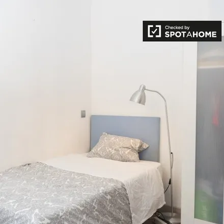 Rent this 6 bed room on Rua da Vitória 44 in 1100-416 Lisbon, Portugal