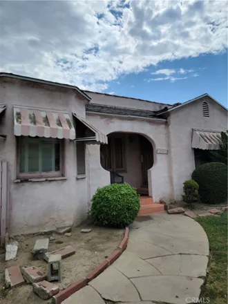 Buy this 3 bed house on 6109 Cimarron Street in Los Angeles, CA 90047