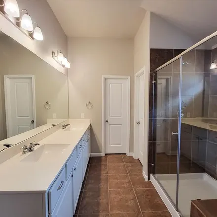 Rent this 4 bed apartment on 31203 Gulf Cypress Lane in Harris County, TX 77447