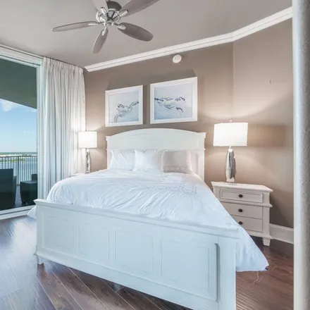 Rent this 4 bed condo on Orange Beach