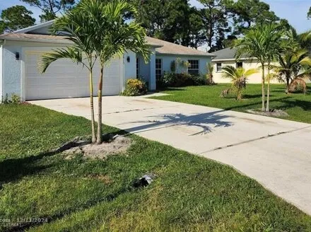 Rent this 3 bed house on 2815 SE Cabana Ln in Port Saint Lucie, Florida