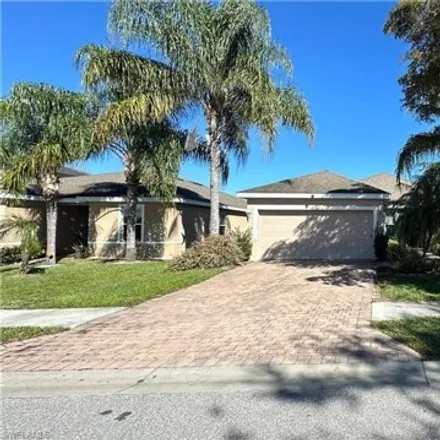 Rent this 3 bed house on 10363 Canal Brook Lane in Lehigh Acres, FL 33936