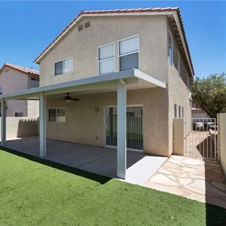 Rent this 4 bed house on 9422 West Vivid Colors Avenue in Spring Valley, NV 89148