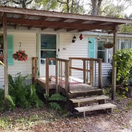 Buy this studio apartment on 1363 Southeast 349 Highway in Suwannee, Dixie County